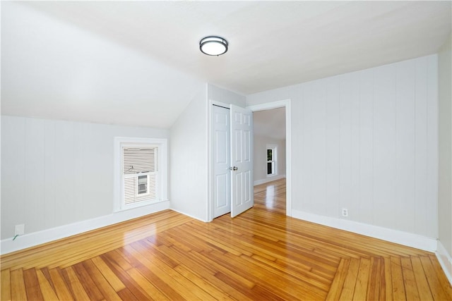 130 Hunts Ave, Pawtucket, RI 02861 - additional living space with light wood finished floors, baseboards, and lofted ceiling