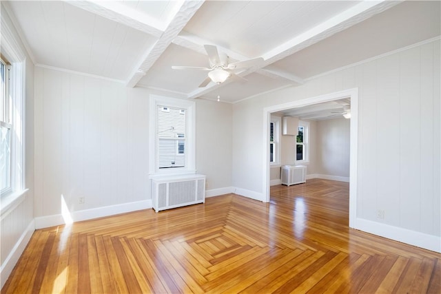 130 Hunts Ave, Pawtucket, RI 02861 - empty room featuring radiator heating unit, ceiling fan, plenty of natural light, baseboards, and beam ceiling
