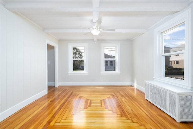 130 Hunts Ave, Pawtucket, RI 02861 - unfurnished room featuring radiator heating unit, baseboards, beam ceiling, and a ceiling fan