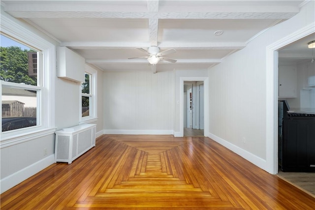 130 Hunts Ave, Pawtucket, RI 02861 - spare room with baseboards, radiator heating unit, ceiling fan, beam ceiling, and coffered ceiling