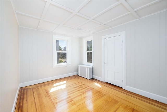 130 Hunts Ave, Pawtucket, RI 02861 - spare room featuring radiator heating unit, baseboards, and light wood-style flooring