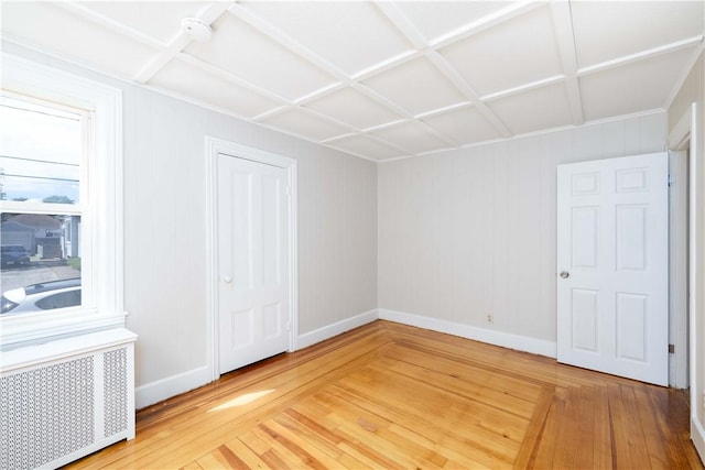 130 Hunts Ave, Pawtucket, RI 02861 - unfurnished bedroom featuring radiator heating unit, baseboards, and light wood-type flooring
