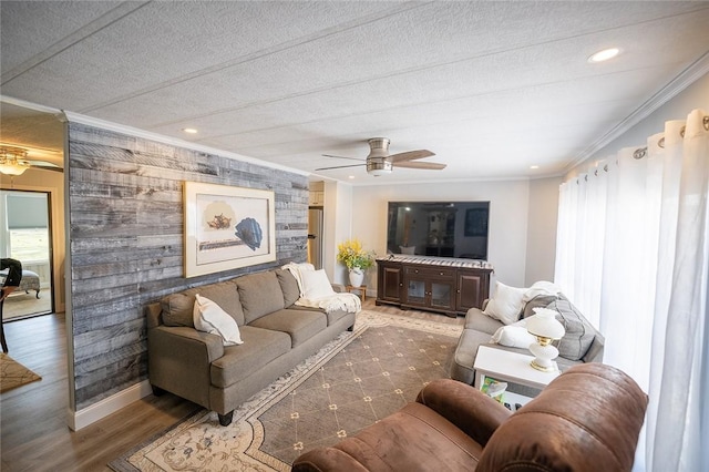 7 Lane D Dr, Coventry, RI 02816 - living area featuring a ceiling fan, crown molding, wood finished floors, baseboards, and recessed lighting