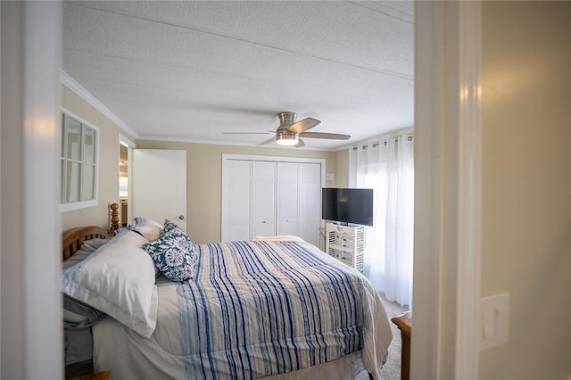 7 Lane D Dr, Coventry, RI 02816 - bedroom featuring a closet, ornamental molding, a textured ceiling, and ceiling fan