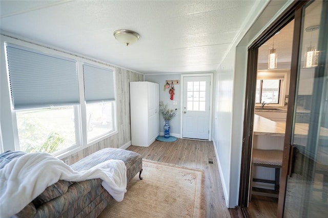 7 Lane D Dr, Coventry, RI 02816 - entryway with wood finished floors and baseboards