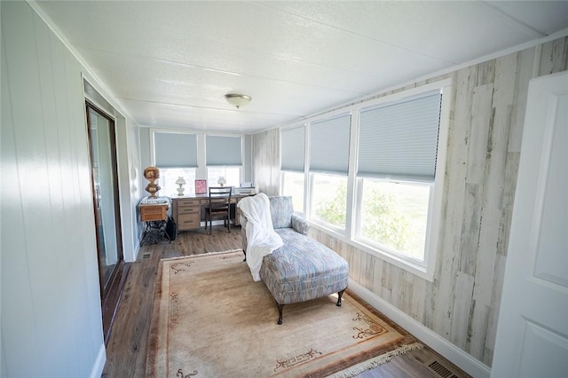 7 Lane D Dr, Coventry, RI 02816 - sitting room with wood finished floors, healthy amount of natural light, wood walls, and a desk