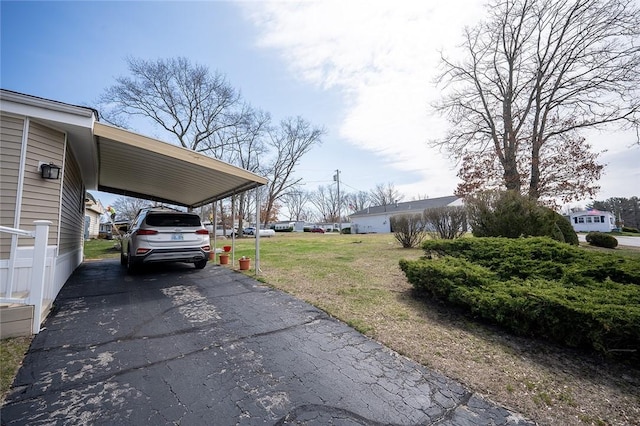 7 Lane D Dr, Coventry, RI 02816 - view of parking / parking lot featuring driveway and an attached carport