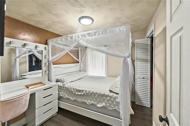 848 Dexter St, Central Falls, RI 02863 - bedroom with dark wood-style floors