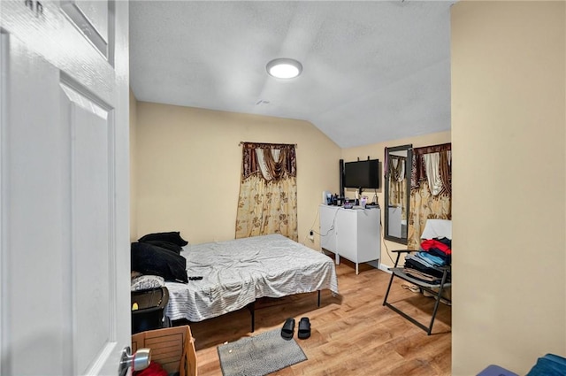 848 Dexter St, Central Falls, RI 02863 - bedroom featuring wood finished floors and vaulted ceiling