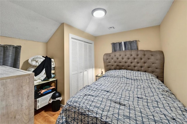 848 Dexter St, Central Falls, RI 02863 - bedroom with wood finished floors and a closet