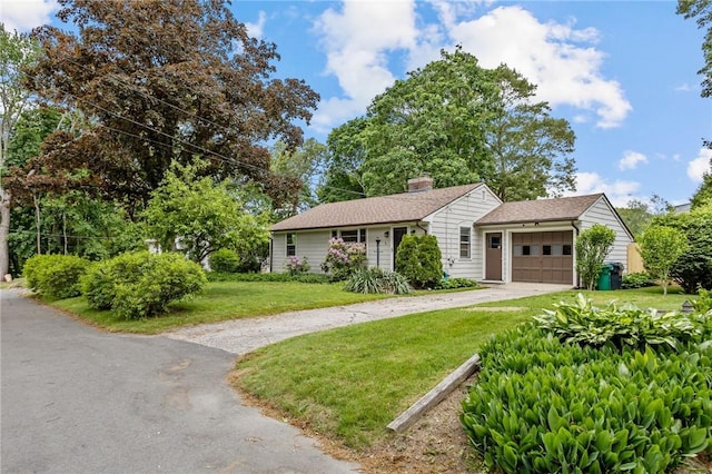 199 Vaughn Ave, Warwick, RI 02886 - view of front of property featuring driveway, an attached garage, a front lawn, and a chimney