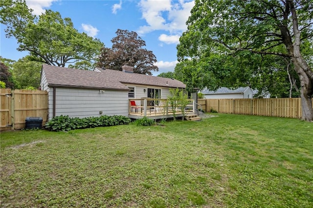 199 Vaughn Ave, Warwick, RI 02886 - back of house featuring a deck, a chimney, and a shingled roof