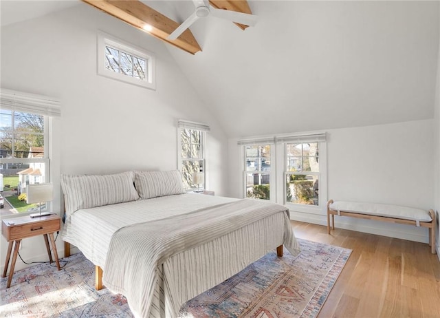 14 Robinson St, Narragansett, RI 02882 - bedroom with beam ceiling, wood finished floors, ceiling fan, and high vaulted ceiling