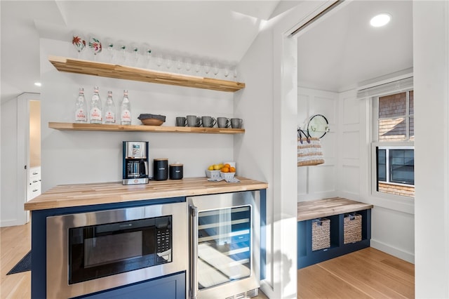 14 Robinson St, Narragansett, RI 02882 - bar area with wine cooler, built in microwave, light wood-style floors, recessed lighting, and baseboards