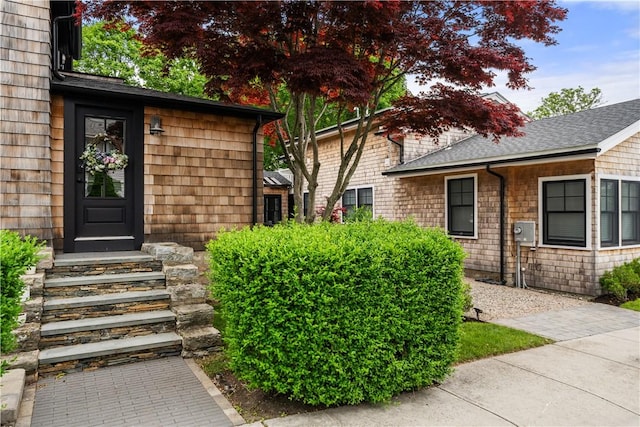 14 Robinson St, Narragansett, RI 02882 - view of exterior entry with a shingled roof