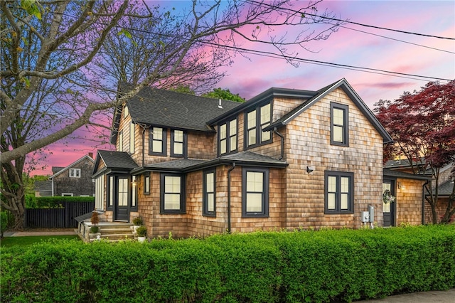 14 Robinson St, Narragansett, RI 02882 - back of property at dusk featuring a shingled roof