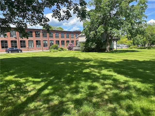 75 Croade St, Warren, RI 02885 - view of home's community featuring a lawn