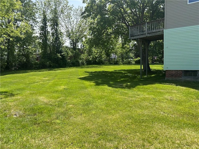 75 Croade St, Warren, RI 02885 - view of green lawn featuring a wooden deck