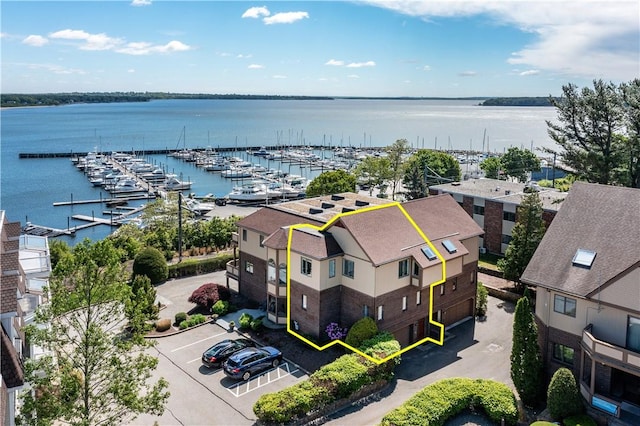 3976 Post Rd, Warwick, RI 02886 - aerial overview of property's location featuring a large body of water, property boundaries highlighted, and a marina