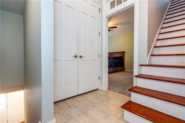 3976 Post Rd, Warwick, RI 02886 - stairs with wood finished floors and ceiling fan