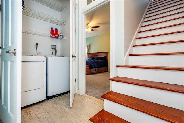 3976 Post Rd, Warwick, RI 02886 - laundry area featuring washing machine and clothes dryer, light wood-type flooring, and a ceiling fan