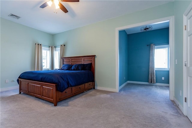 3976 Post Rd, Warwick, RI 02886 - bedroom featuring light colored carpet, baseboards, and a ceiling fan