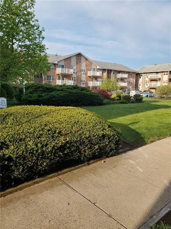 23 Bullocks Point Ave Unit 2/4C, East Providence, RI 02915 - view of community featuring a lawn