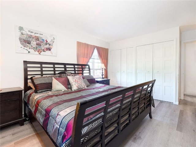 23 Bullocks Point Ave Unit 2/4C, East Providence, RI 02915 - bedroom featuring multiple closets and wood finished floors