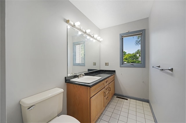 29 Valley View Dr, Cranston, RI 02921 - half bathroom with toilet, vanity, tile patterned floors, and baseboards