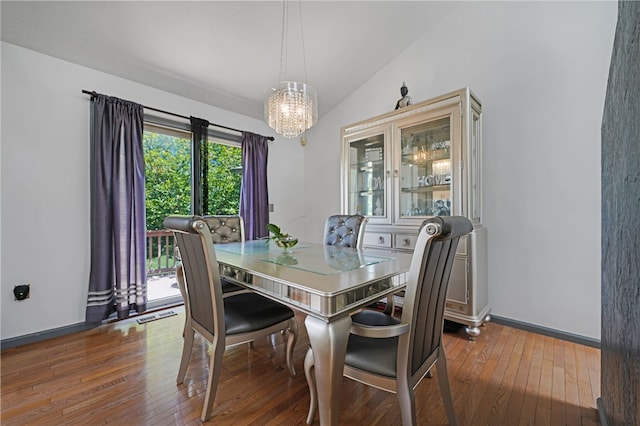 29 Valley View Dr, Cranston, RI 02921 - dining area featuring hardwood / wood-style flooring, a chandelier, lofted ceiling, and baseboards