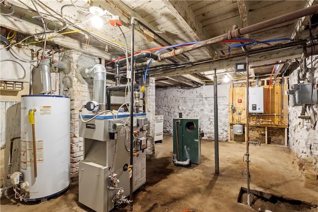 9 Woodbine St, Providence, RI 02906 - unfinished below grade area with water heater and a heating unit