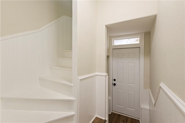 9 Woodbine St, Providence, RI 02906 - foyer entrance featuring a wainscoted wall and dark wood-style flooring
