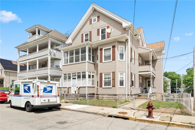 149 6th Ave, Woonsocket, RI 02895 - view of front of property with a fenced front yard and a gate