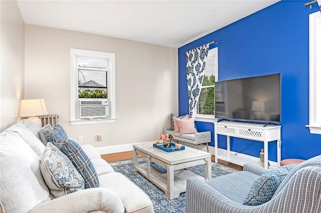 165 Wentworth Ave Unit 2E, Cranston, RI 02905 - living area featuring cooling unit, wood finished floors, and baseboards
