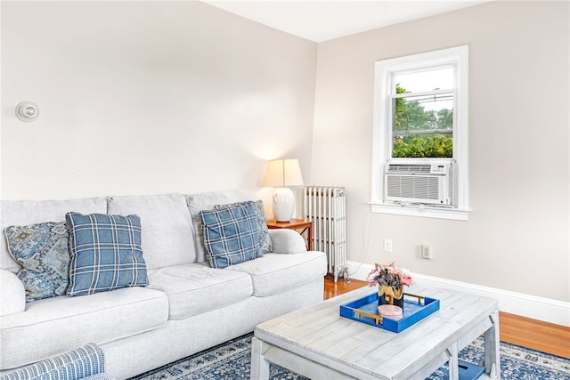 165 Wentworth Ave Unit 2E, Cranston, RI 02905 - living area with radiator, baseboards, and wood finished floors