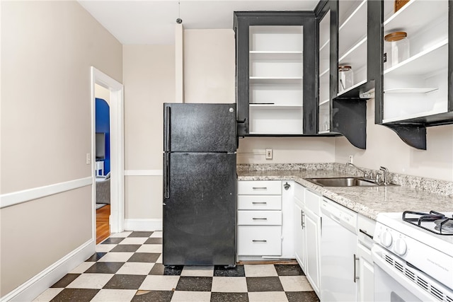 165 Wentworth Ave Unit 2E, Cranston, RI 02905 - kitchen featuring white appliances, dark floors, a sink, white cabinetry, and open shelves