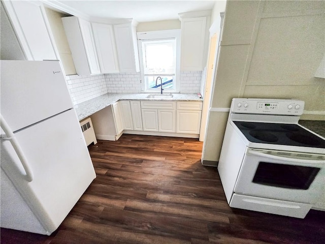 106 Baxter St, Pawtucket, RI 02861 - kitchen featuring white appliances, a sink, dark wood-style floors, radiator, and tasteful backsplash