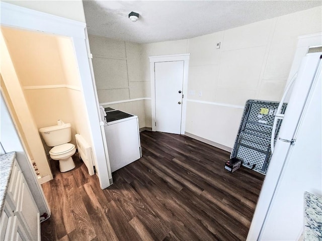 106 Baxter St, Pawtucket, RI 02861 - laundry room with dark wood-style floors and washer / dryer