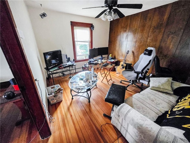 106 Baxter St, Pawtucket, RI 02861 - home office featuring ceiling fan, wood finished floors, and wooden walls