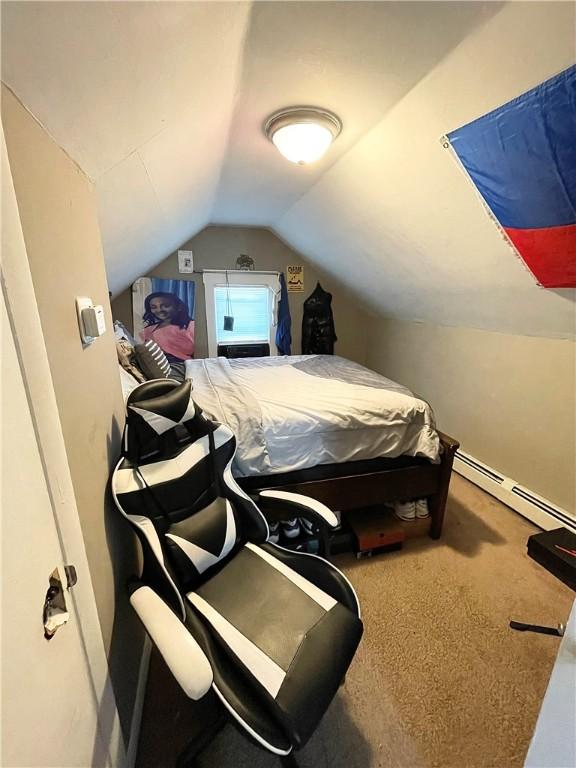 86 Edgemere Ave, Providence, RI 02909 - bedroom with lofted ceiling, carpet, and baseboard heating