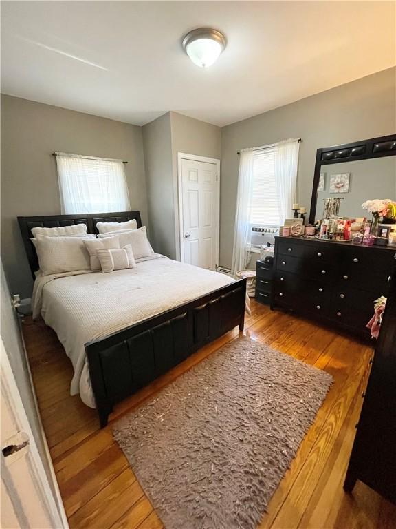 86 Edgemere Ave, Providence, RI 02909 - bedroom with wood finished floors and multiple windows