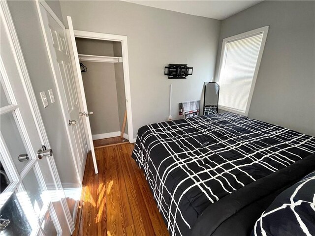 86 Edgemere Ave, Providence, RI 02909 - bedroom featuring wood finished floors, baseboards, and a closet