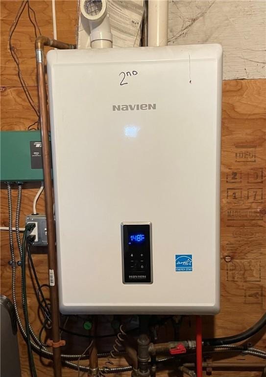 86 Edgemere Ave, Providence, RI 02909 - utility room featuring tankless water heater