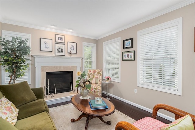 3 Berm Dr, Cumberland, RI 02864 - living room with baseboards, wood finished floors, crown molding, and a high end fireplace