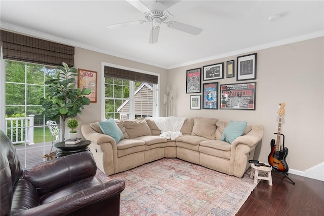 3 Berm Dr, Cumberland, RI 02864 - living room with crown molding, wood finished floors, baseboards, and ceiling fan