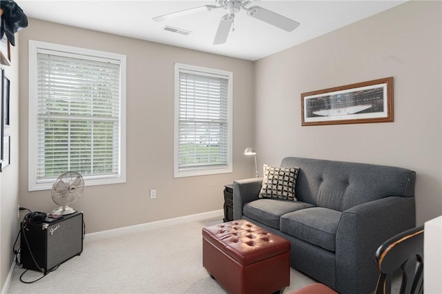 3 Berm Dr, Cumberland, RI 02864 - living area with carpet flooring, ceiling fan, and baseboards