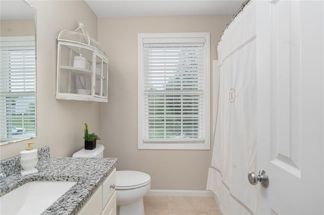 3 Berm Dr, Cumberland, RI 02864 - bathroom featuring vanity, healthy amount of natural light, toilet, and baseboards