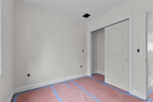 0 Rugby St, Providence, RI 02905 - unfurnished bedroom featuring baseboards and a closet