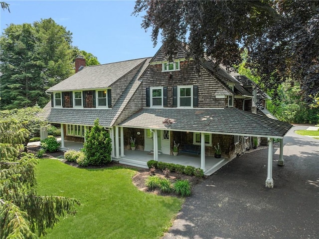 211 Rumstick Rd, Barrington, RI 02806 - shingle-style home with a porch, a front lawn, and a chimney