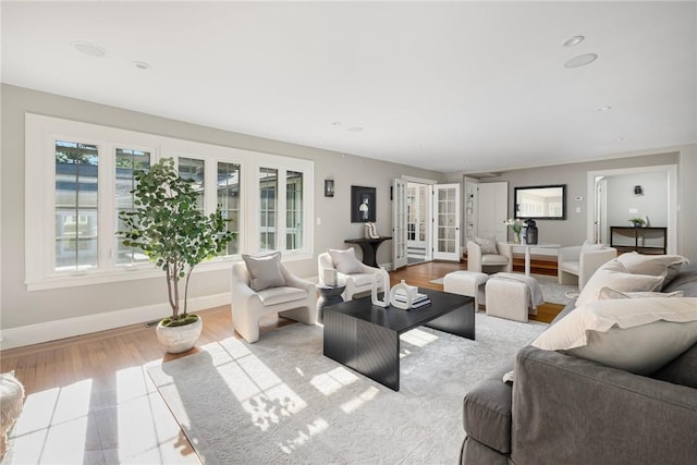 211 Rumstick Rd, Barrington, RI 02806 - living area with french doors and wood finished floors